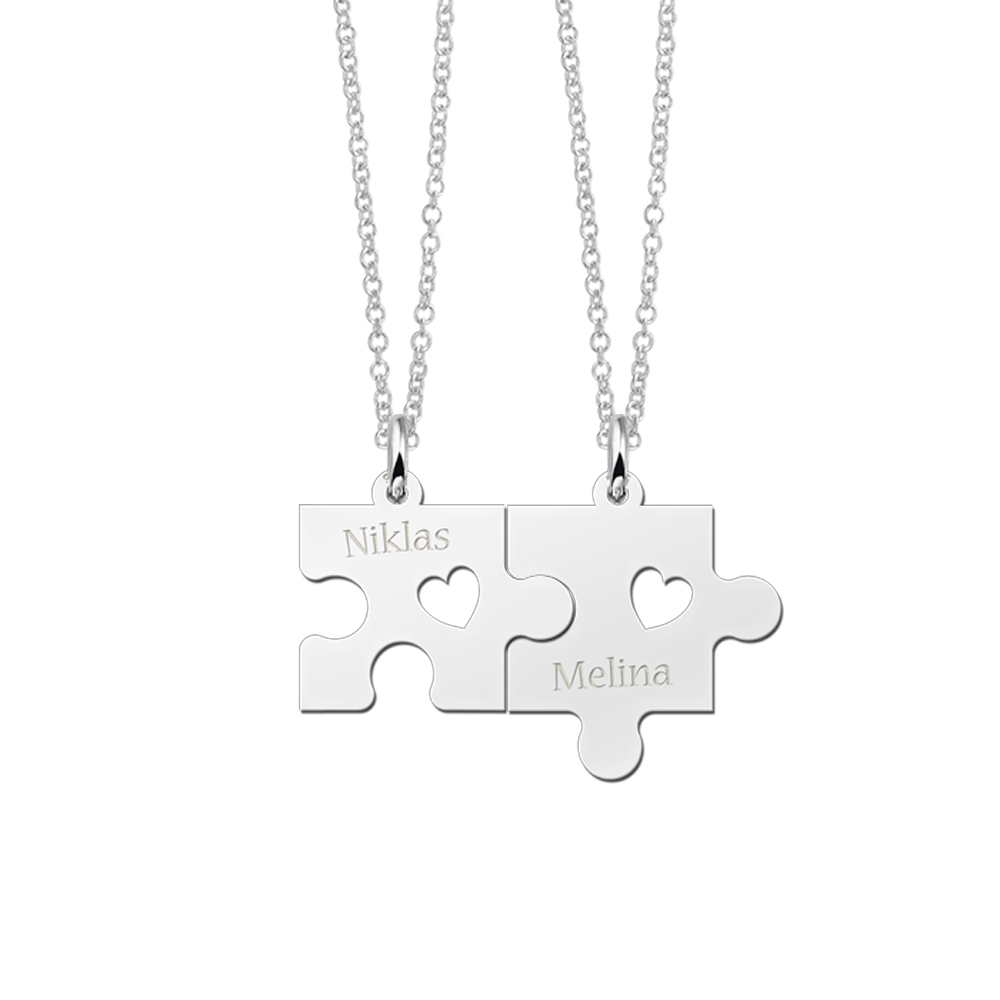 Zilveren vriendschapsketting met puzzelstukjes, hartjes en namen