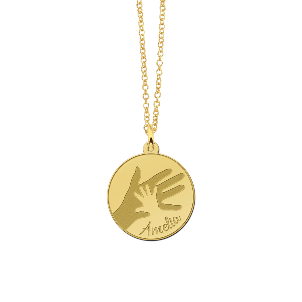 Gouden ronde hanger met grote en kleine handafdruk