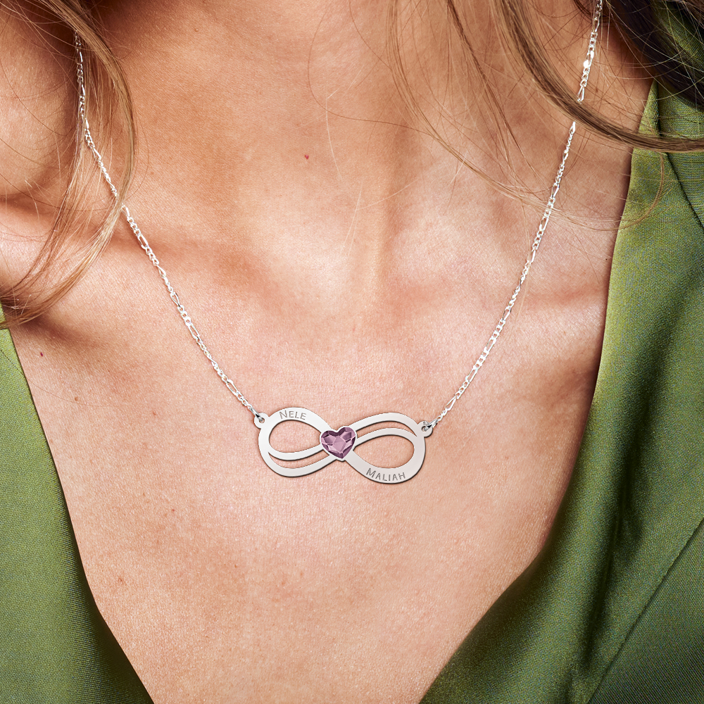 Zilveren infinity ketting met hartjes zirkonia steen