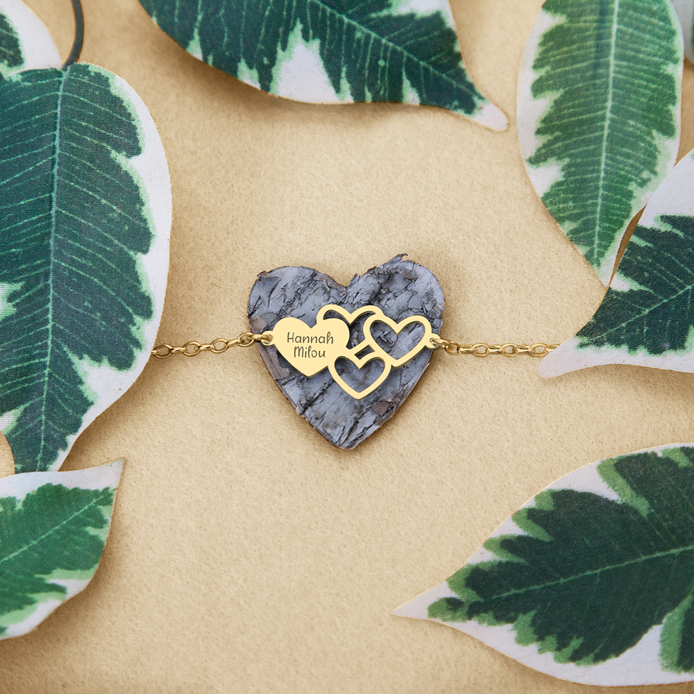 Gouden armband set met namen en hartjes